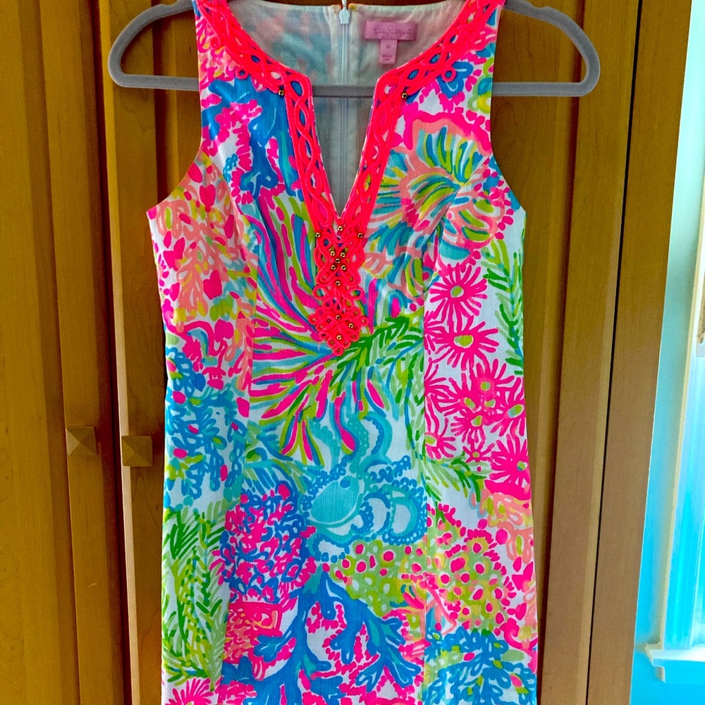 Lilly Pulitzer flower dress with white embroidery.